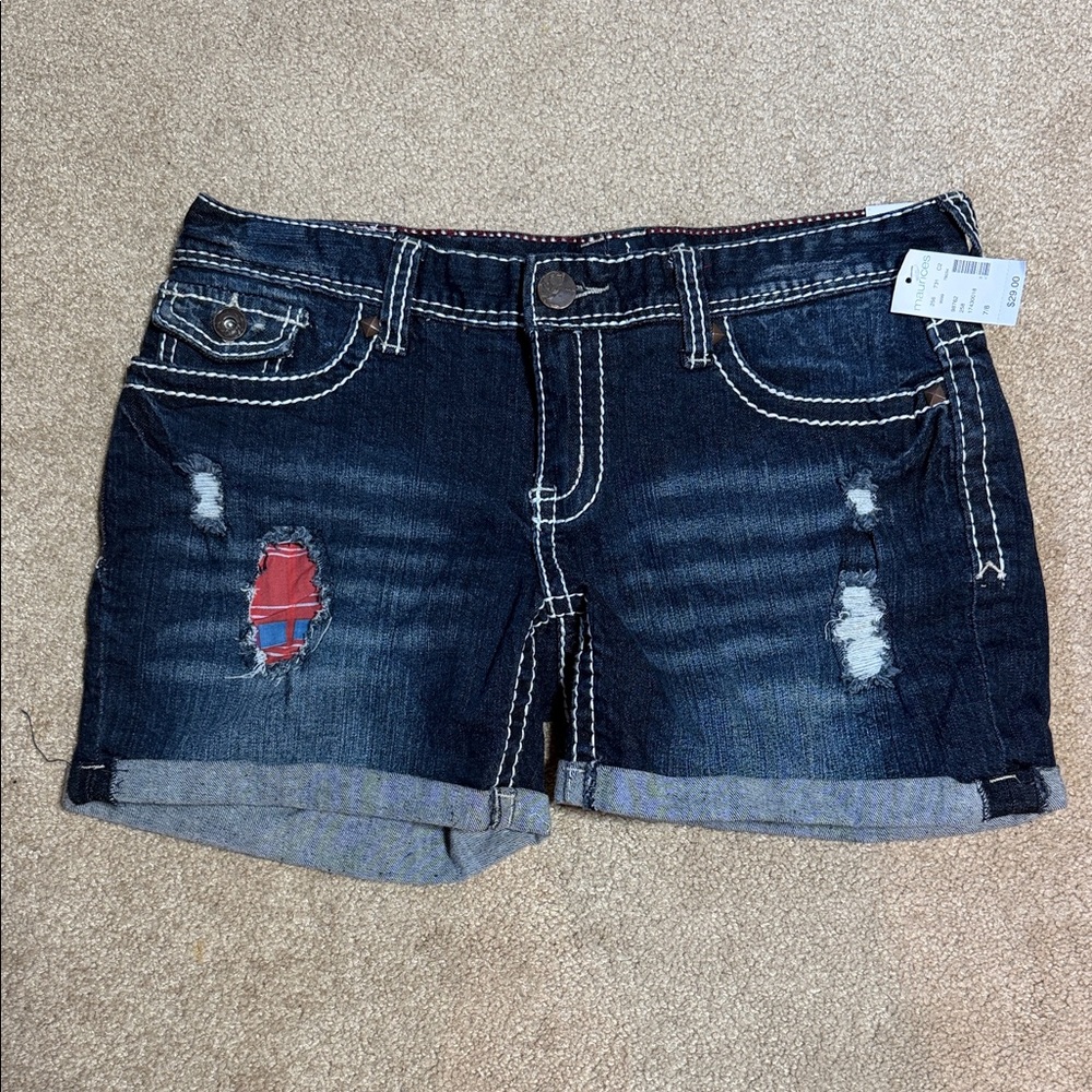 Maurices Dark Blue Distressed Roll-Hem Denim Shorts with Red Patch